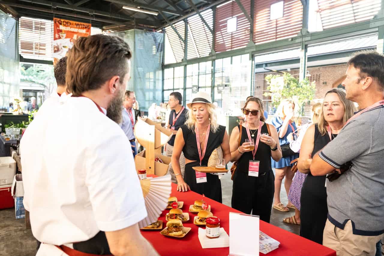Guests enjoying a Grand Tasting at the Food & Wine Classic in Charleston